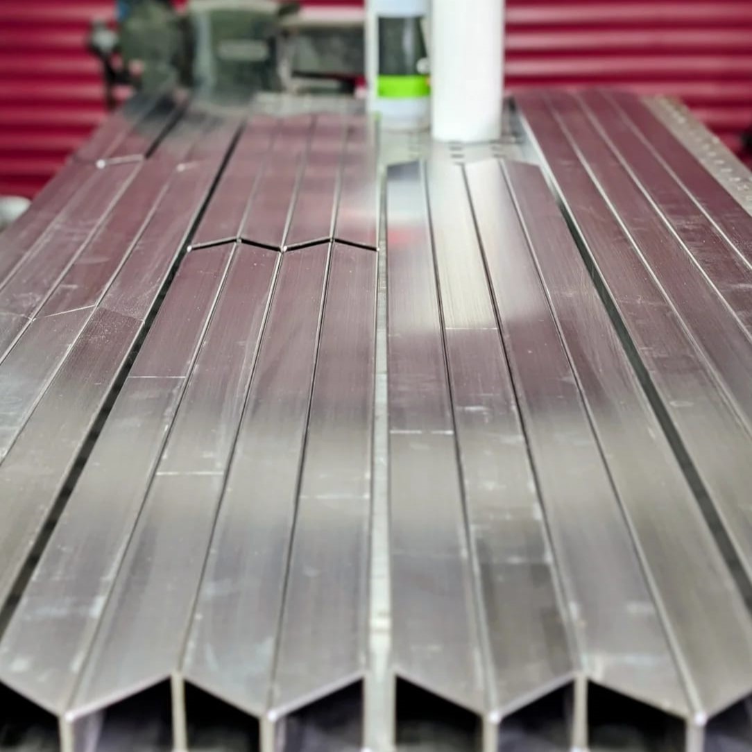 Custom timber and metal furniture fabricated by Ursa fab.